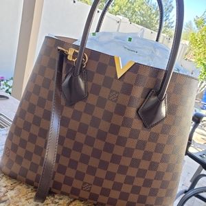Louis Vuitton hand and shoulder bag...